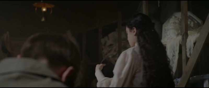 The creepy serpent guy wore a dramatic full-length wool