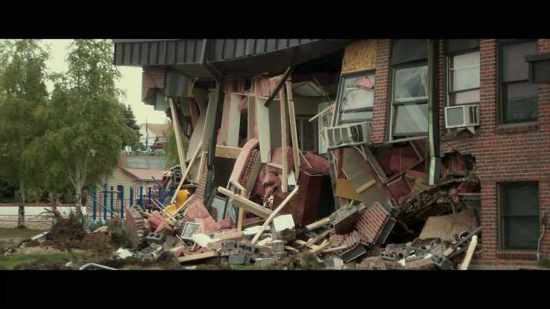 The dozer methodically tore apart town hall
