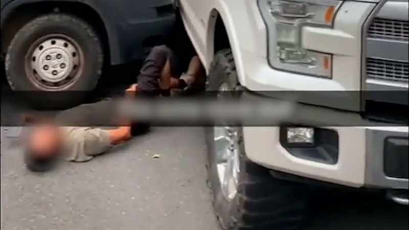 The driver suffers a leg injury