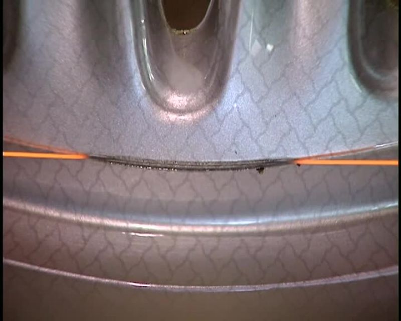 THE EDGES ARE THEN SANDED TO EVEN THEM