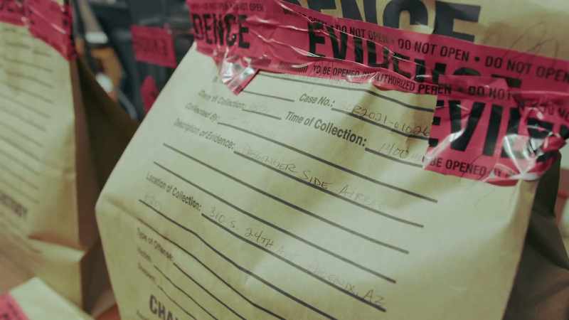 The evidence bags with his clothing