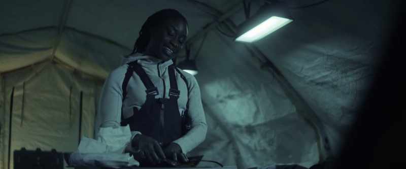 The experimenter held up their hand next to a cage