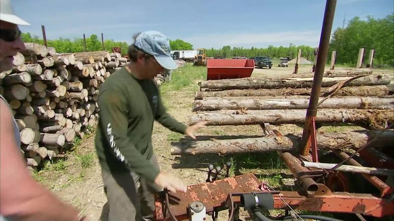 THE FIRST STEP IN MAKING A LOG HOME