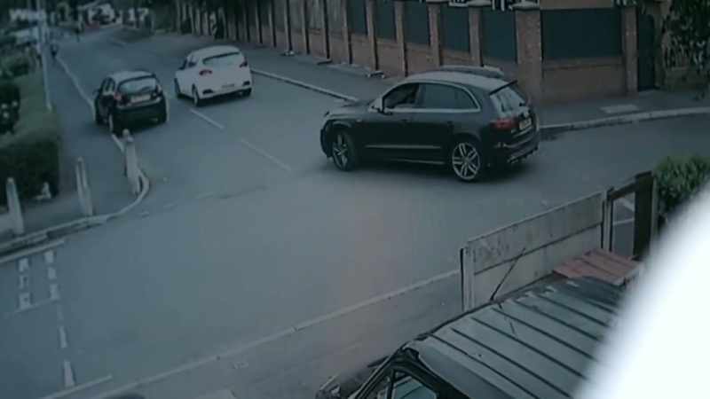 The footage appears to show Cox