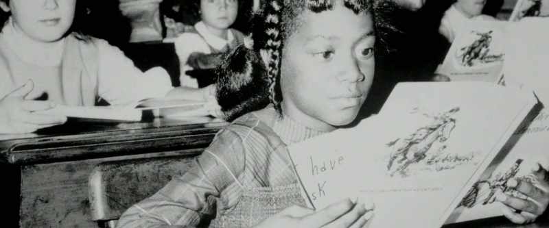 The Jim Crow era and Ruby Bridges going to school