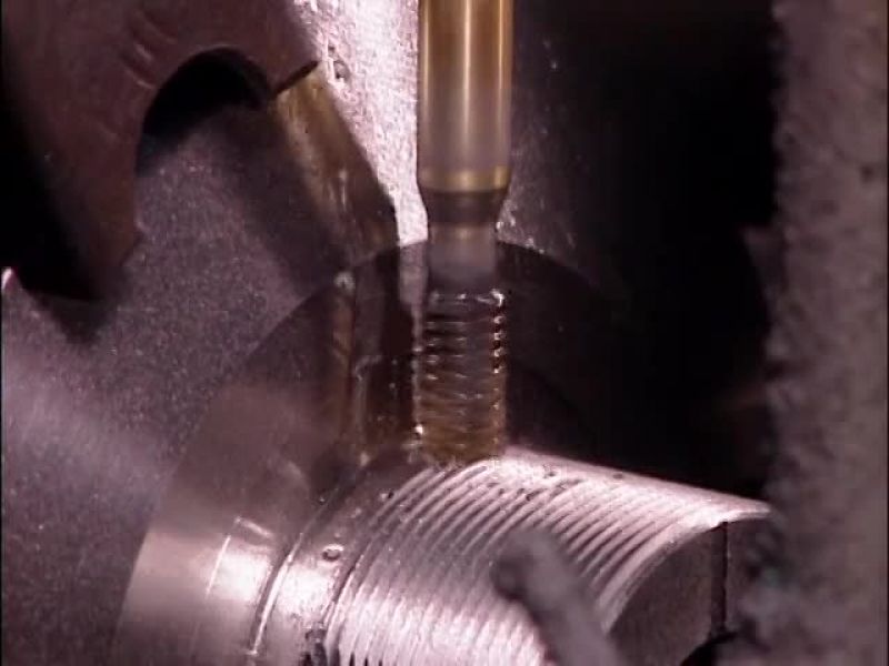 THE LAST OPERATION DRILLS HOLES FOR TWO SCREWS