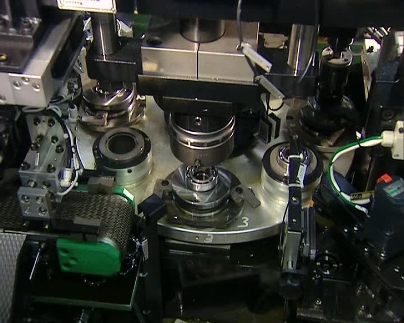 THE MACHINE TEST-SPINS THE BEARING