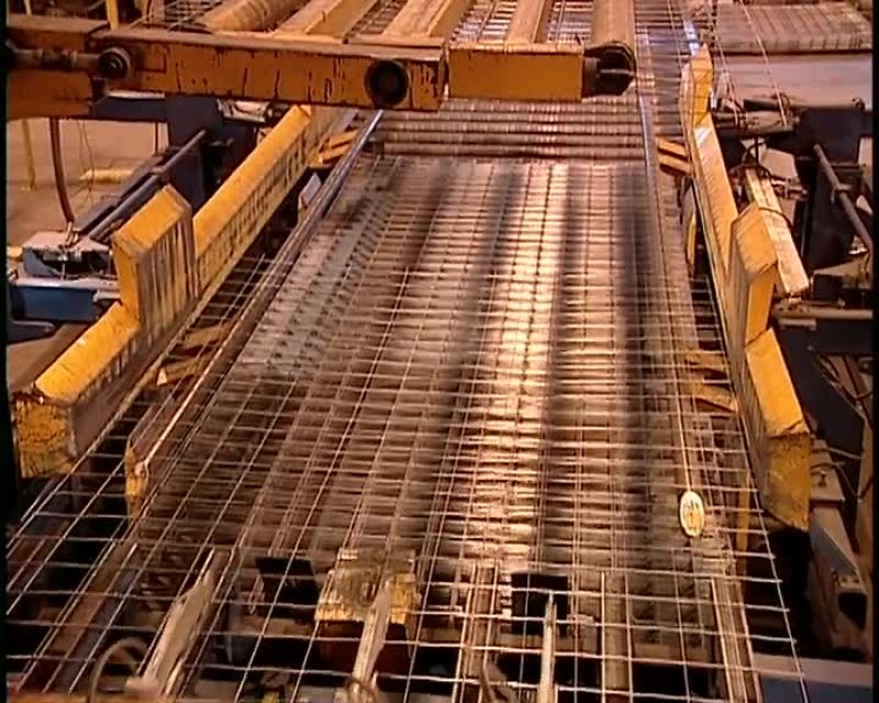 THE MACHINERY THEN STACKS THE WELDED PANELS