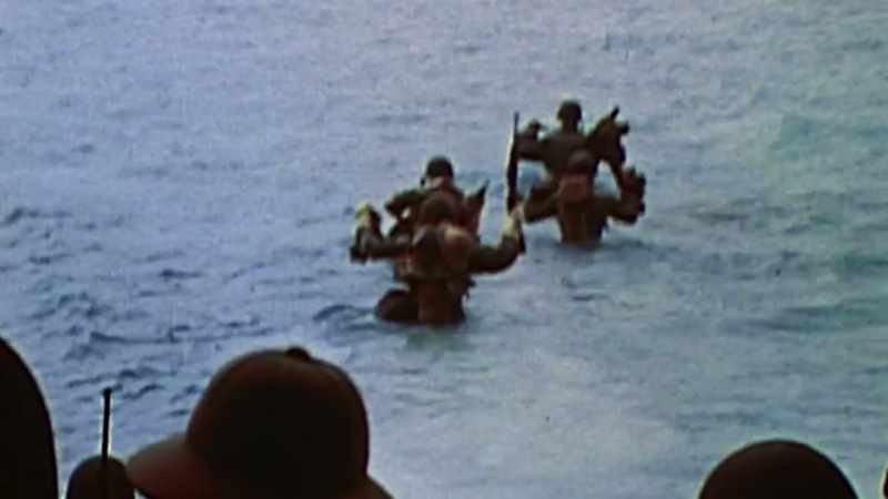 The Marines are forced to wade 700 yards