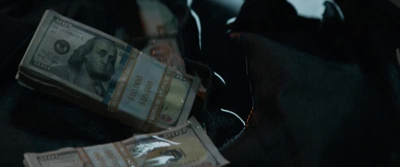 The money is doused in gasoline