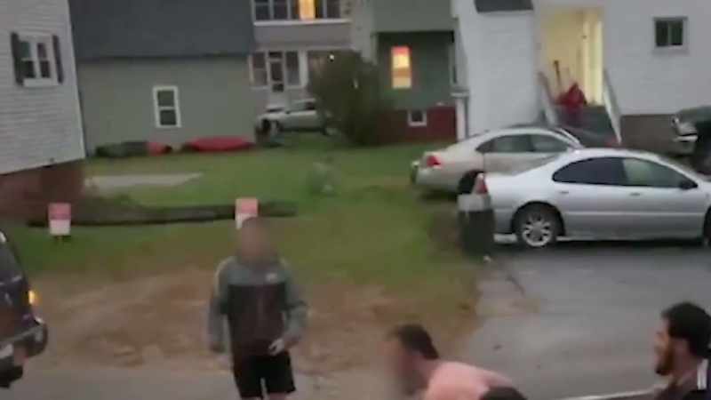 �The neighbor was charged with criminal threatening