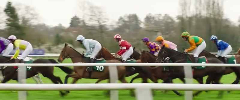 The pack rounding the far bend