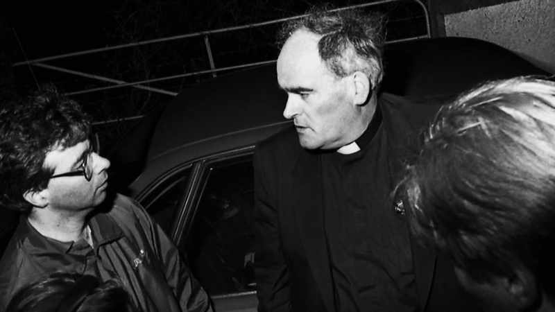 The parish priest arrived up