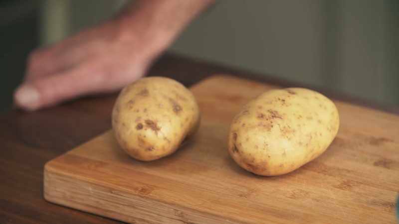 The process starts by peeling potatoes