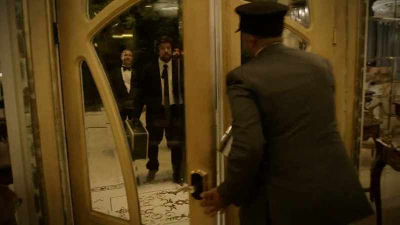 The security guard meets them