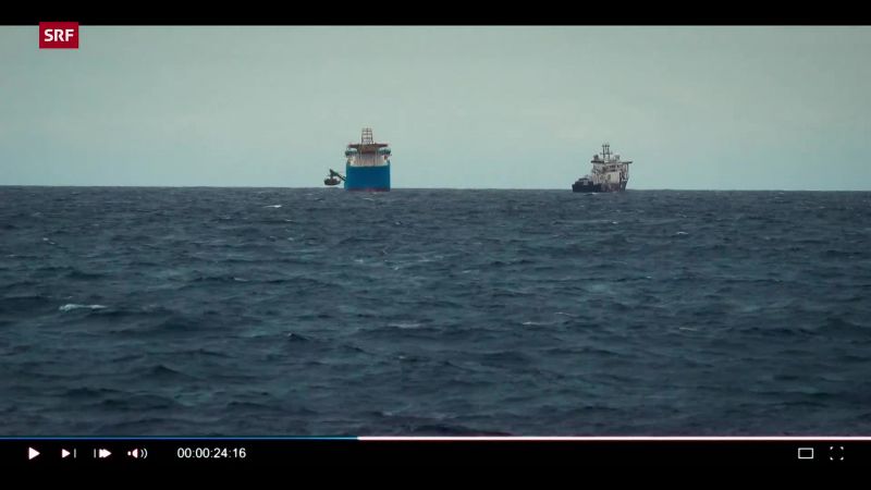 The ship on the left with the trench cutters is for dredging