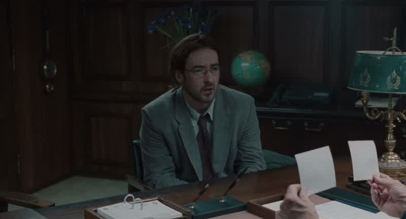 The symbol on the left is not a letter, sir