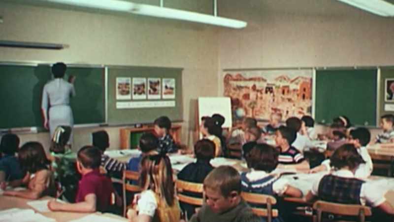 The teacher was writing somethin'