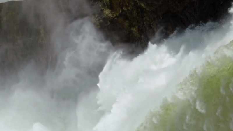 The thundering whitewater slices through rock
