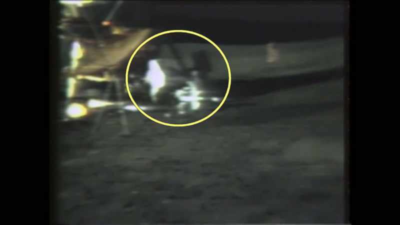 The two astronauts are preparing to re-enter the LEM