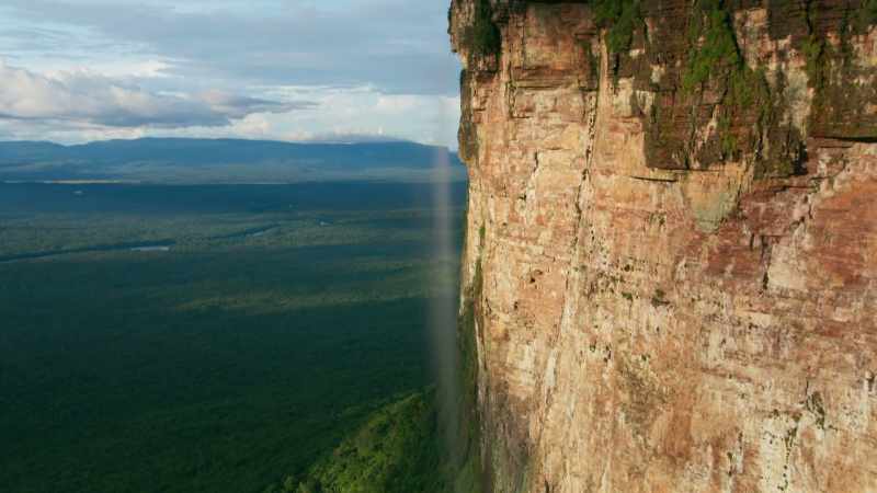 The vertical cliffs surrounding many of these mountains