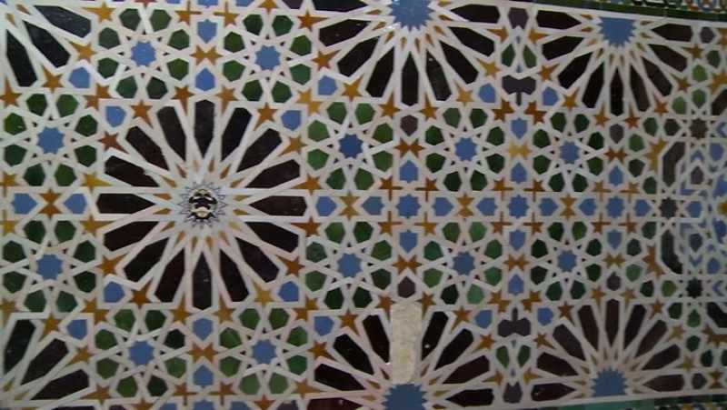 The wall and floor mosaics at the Alhambra
