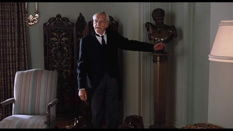 The water closet is in here sir