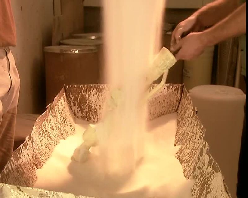 THEN COAT IT WITH POWDERED SILICONE