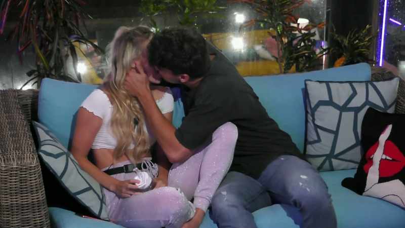 THEN HE HELD HER AS TIGHTLY AS SHE HELD HER WATER BOTTLE
