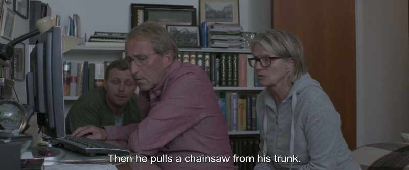 Then he pulls a chainsaw from his trunk