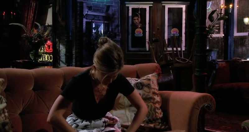 Then she stops, leans on a table and drops her head