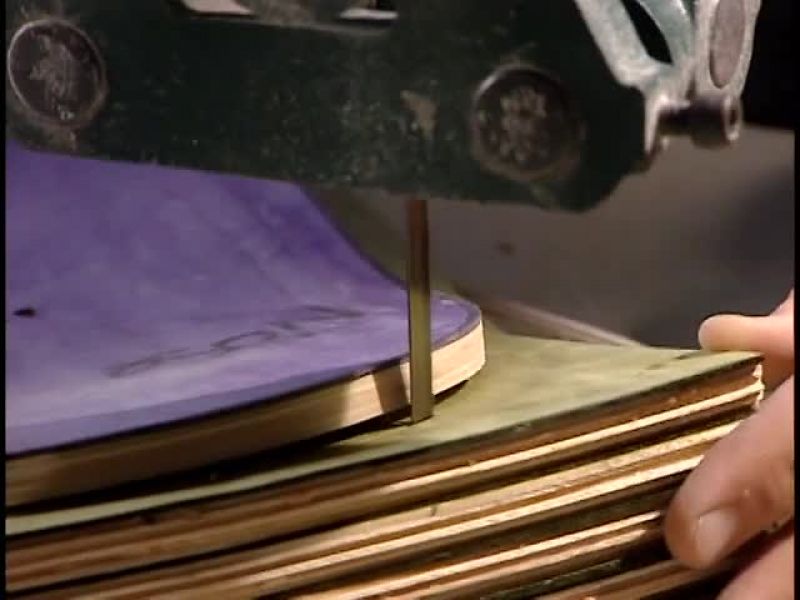 THEN THEY SMOOTH ALL THE SURFACES AGAINST A DRUM SANDER