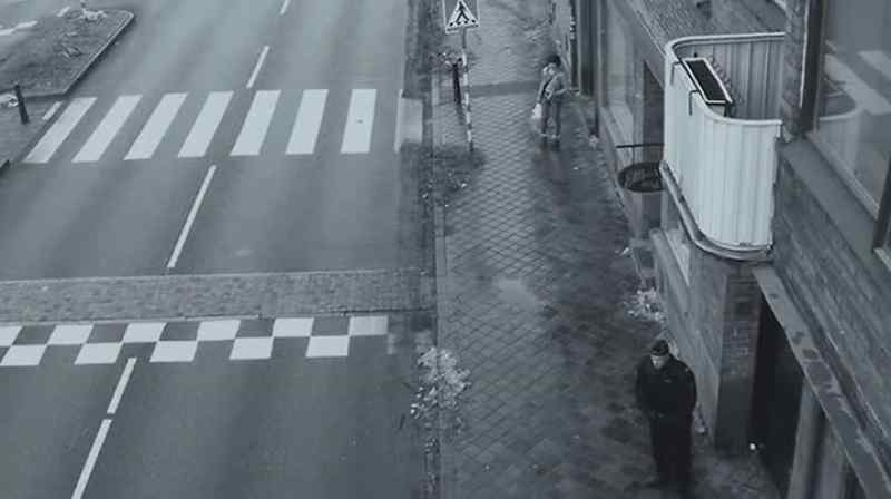 There! She sees the officer and turns around