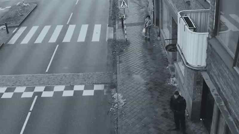 There. She turns around when she sees the officer