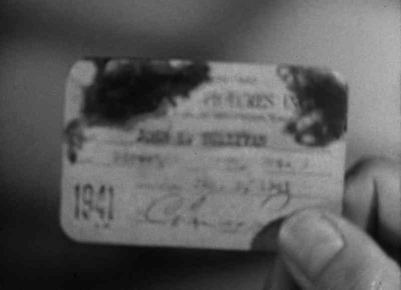 There's a card here, it's hard to read, it's all splattered