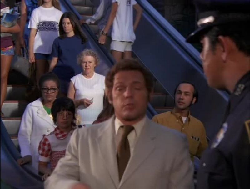 THERE'S A GUY CUFFED TO THE RAILING UP THERE. PICK HIM UP