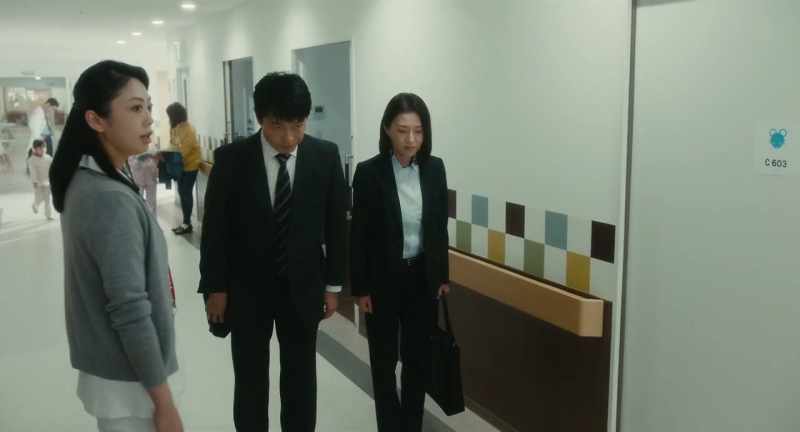 They are both cops. Santo. Osuka