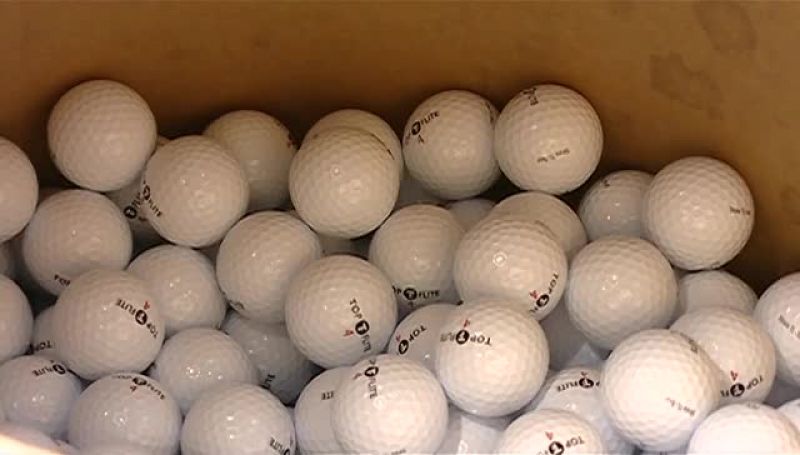 THEY DUMP THE BALLS INTO A BIN