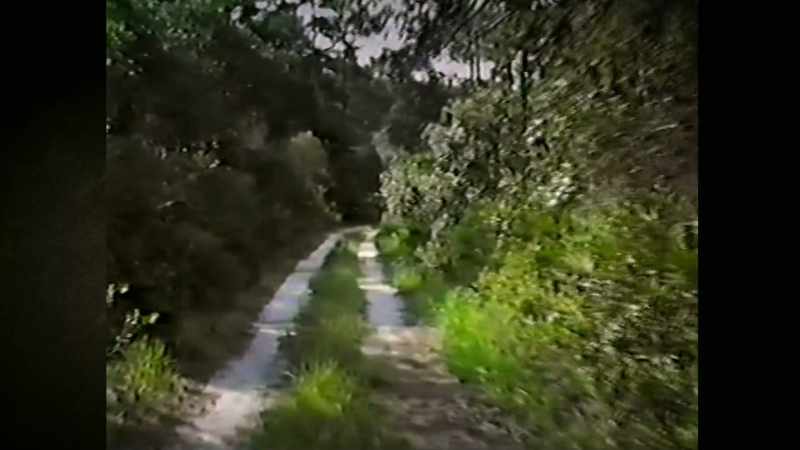 They go down this dirt road