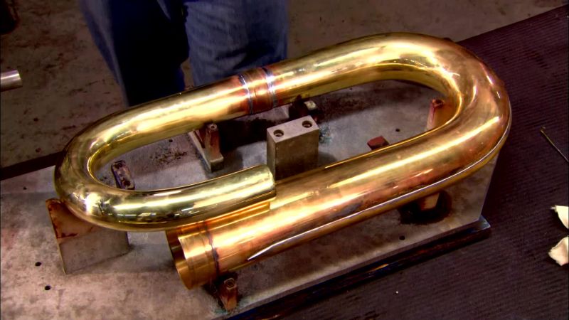 THEY INSERT A SUPPORT BRACE INSIDE THIS FRAME PIECE
