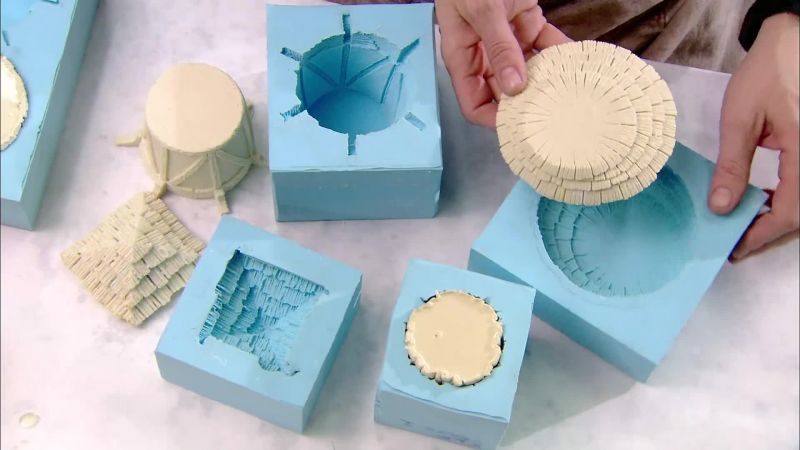 THEY MOLD VARIOUS ROOFS FOR VISUAL INTEREST