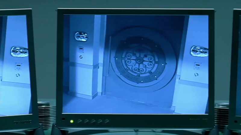 They're in, switch to the vault cameras