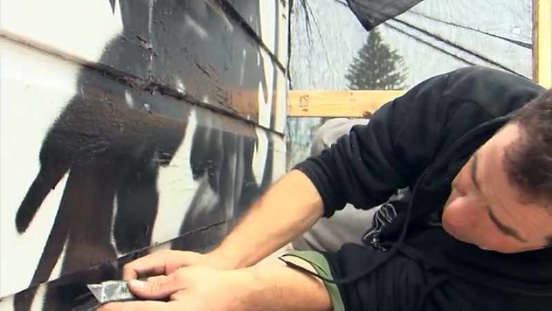 They're working right now to begin taking the painting down