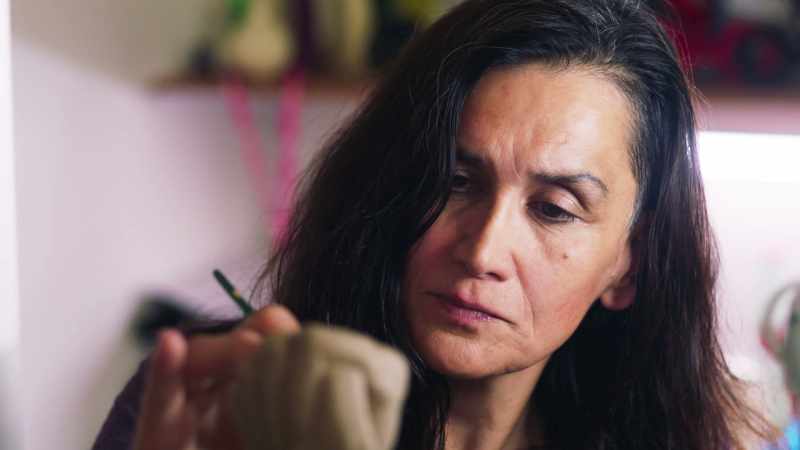 This is Angiani. She specialises in clay work