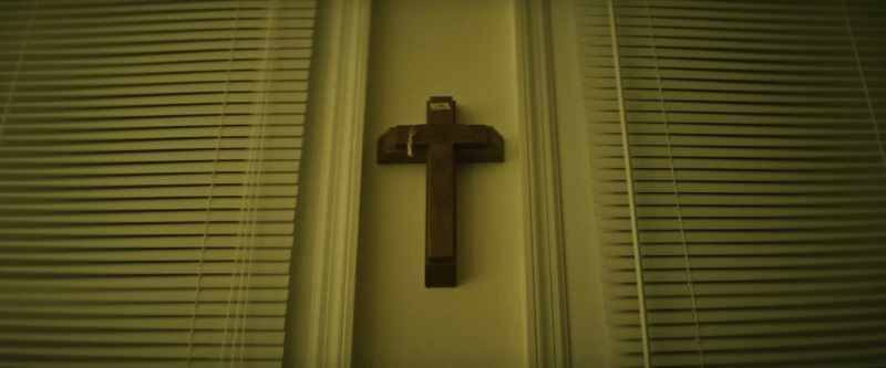 This crucifix only hung on the wall with a single nail