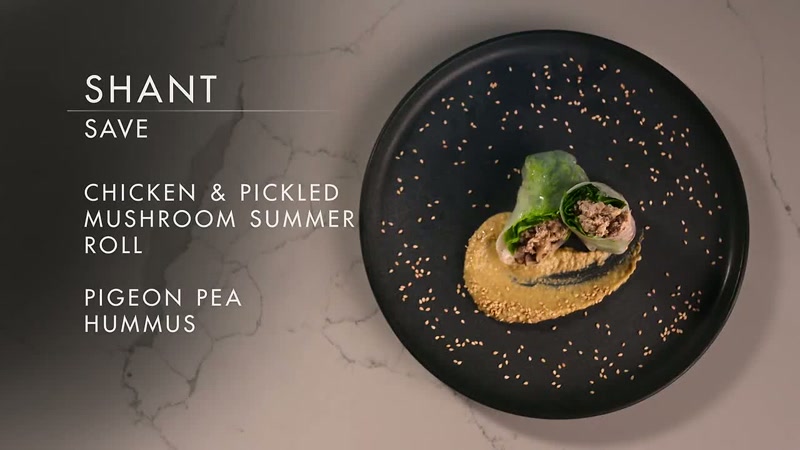 This dish is a chicken and pickled mushroom summer roll