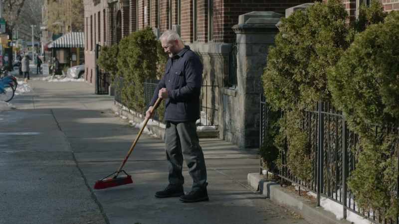 This guy's been sweeping the same square of concrete