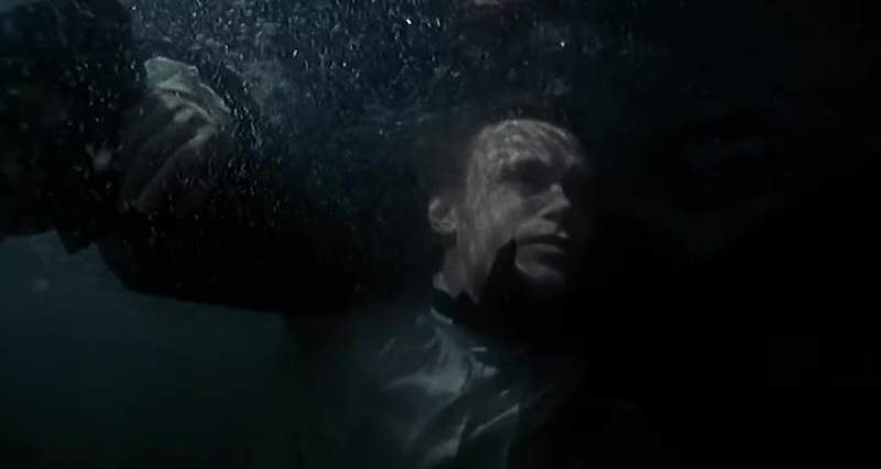 This is John Harmon drowning