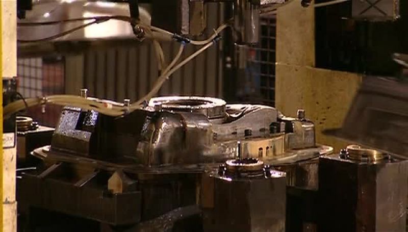 THIS MACHINE TRIMS AWAY THE EXCESS AROUND THE DECK'S EDGES