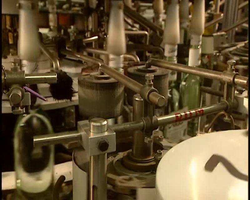 THIS OTHER MACHINE FILLS 120 BOTTLES